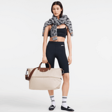 Carregar imagem no visualizador da galeria, NOVA Maxi Bolsa Origami EXPANSÍVEL para Viagem COM LOGO e Alça Transversal (TAMANHO XXG) - Lançamento 2025