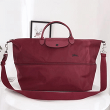 Carregar imagem no visualizador da galeria, NOVA Maxi Bolsa Origami EXPANSÍVEL para Viagem COM LOGO e Alça Transversal (TAMANHO XXG) - Lançamento 2025