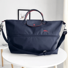 Carregar imagem no visualizador da galeria, NOVA Maxi Bolsa Origami EXPANSÍVEL para Viagem COM LOGO e Alça Transversal (TAMANHO XXG) - Lançamento 2025