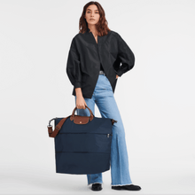 Carregar imagem no visualizador da galeria, NOVA Maxi Bolsa Origami EXPANSÍVEL para Viagem COM LOGO e Alça Transversal (TAMANHO XXG) - Lançamento 2025