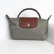 Carregar imagem no visualizador da galeria, Bolsa MINI Origami COM LOGO (TAMANHO 16CM) 2025 - OFERTA - GANHE A ALÇA GRÁTIS HOJE