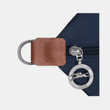 Carregar imagem no visualizador da galeria, NOVA Maxi Bolsa Origami EXPANSÍVEL para Viagem COM LOGO e Alça Transversal (TAMANHO XXG) - Lançamento 2025